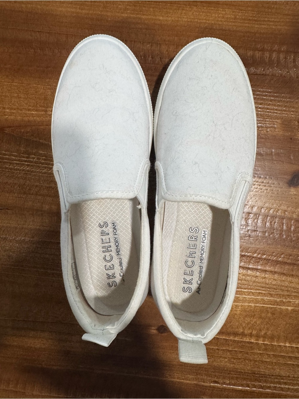 Skechers Women’s Slip-On Sneakers in Off-White Canvas